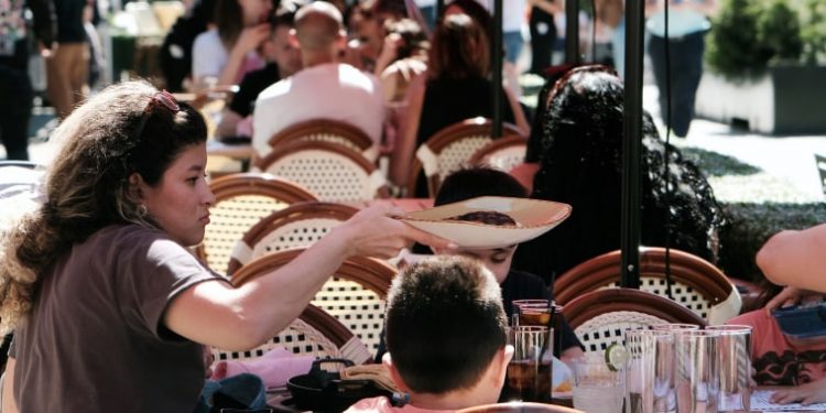 Bank of America CEO says U.S. consumers and businesses have turned cautious on spending