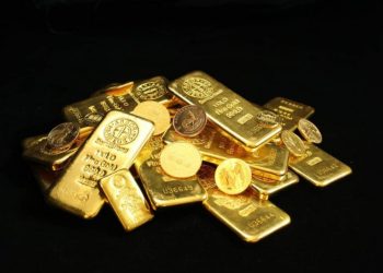 Gold Hits $2,450 on Fed Easing Hopes, Middle East Tensions