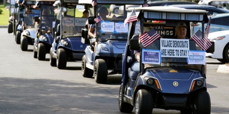 Hundreds of ‘Harris for President’ golf carts roll through Trump stronghold