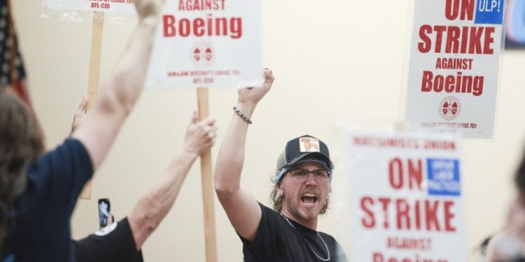 Boeing factory workers strike after overwhelmingly rejecting contract
