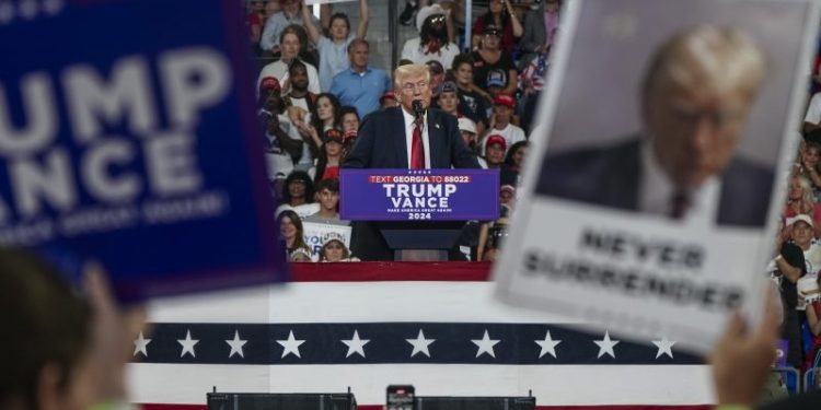 As Trump makes false claims about hurricane relief, White House calls it ‘poison’